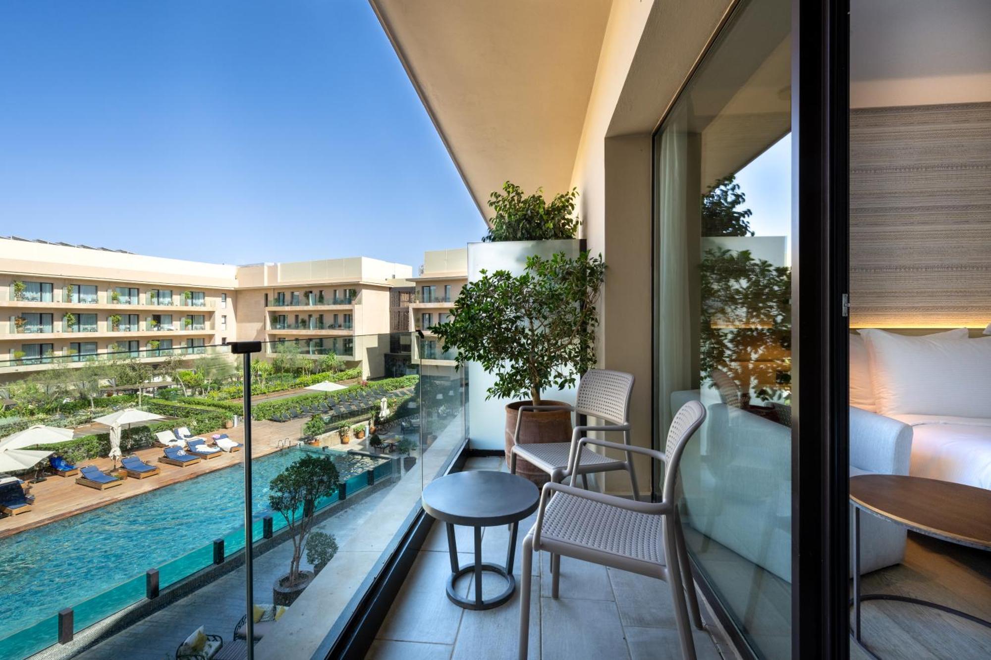 Chambre Premium avec Balcon - Vue sur Piscine
